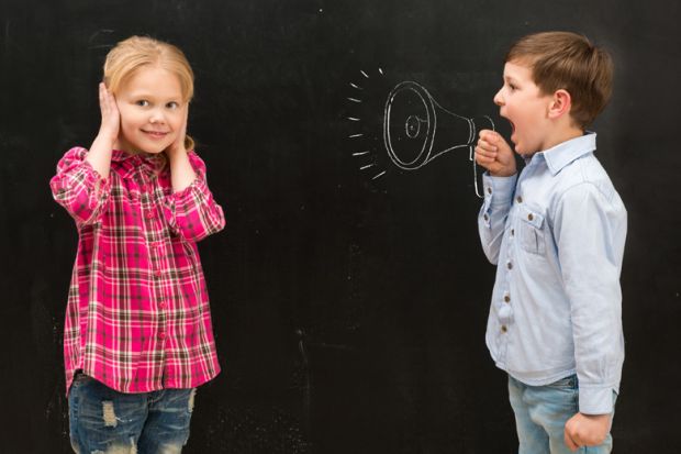 Young boy shouting at girl covering ears