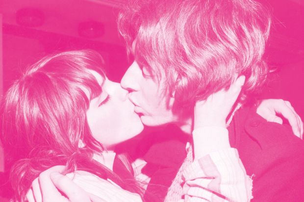 Young couple kissing, 1960s Young couple kissing, 1960s