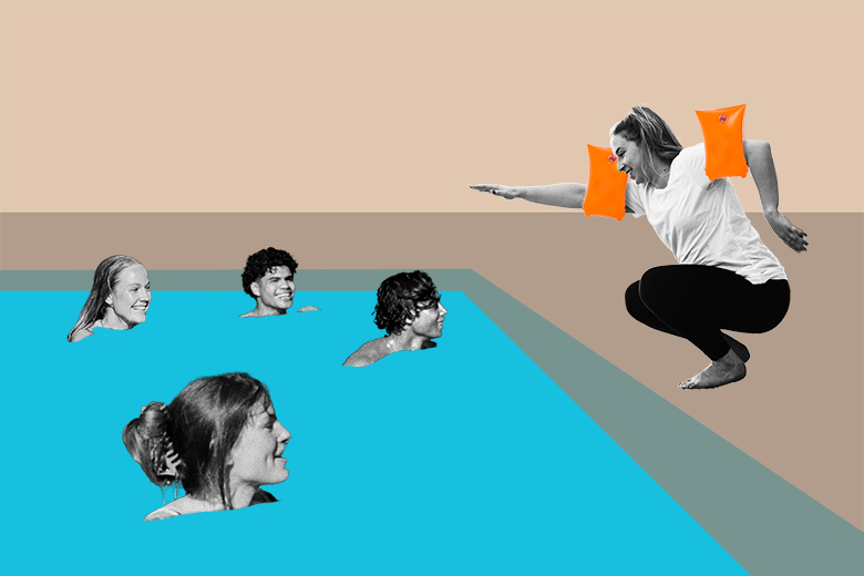 An instructor teaching people to swim while wearing armbands. To illustrate a lack of teaching training for academics.