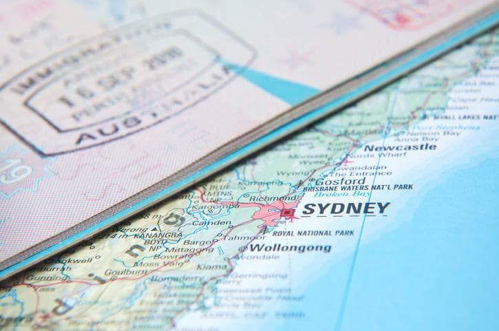 Australian stamp in passport and map of Australia