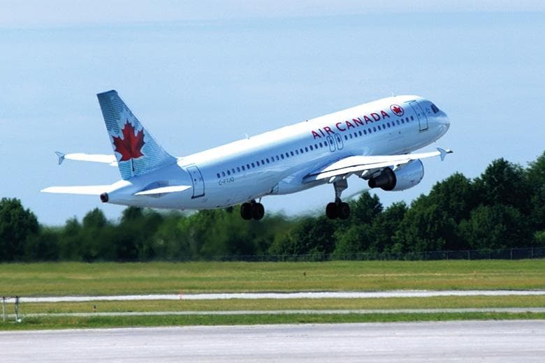 Air Canada plane taking off from runway