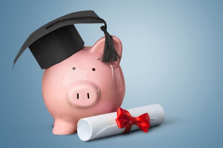Piggy bank wearing mortar board (tuition fees)