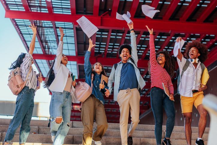Happy students celebrate exam results