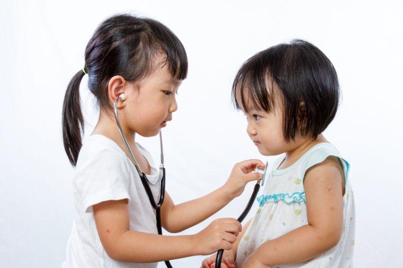 Girls playing doctors