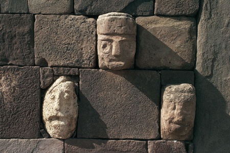 Stone heads fitted to wall at Tiwanaku