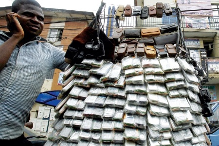 Market trader selling mobile phones